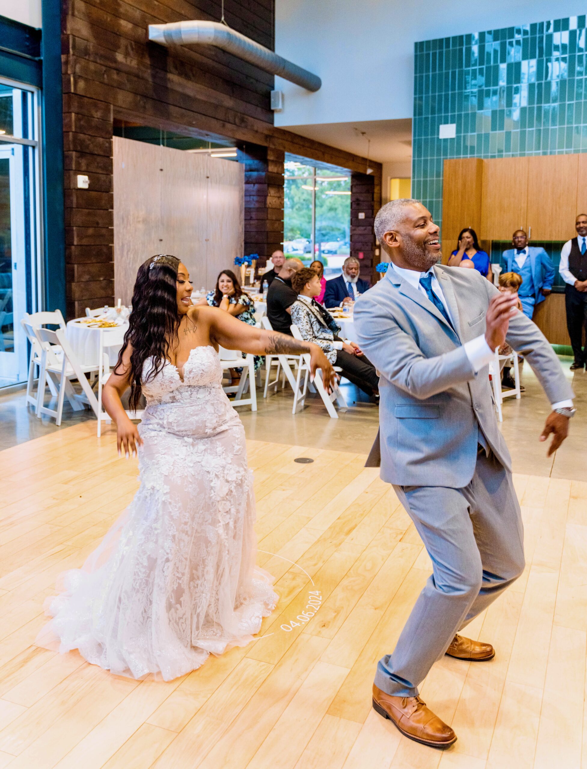 Bride and groom dancing during a LuxLifeExp wedding reception
